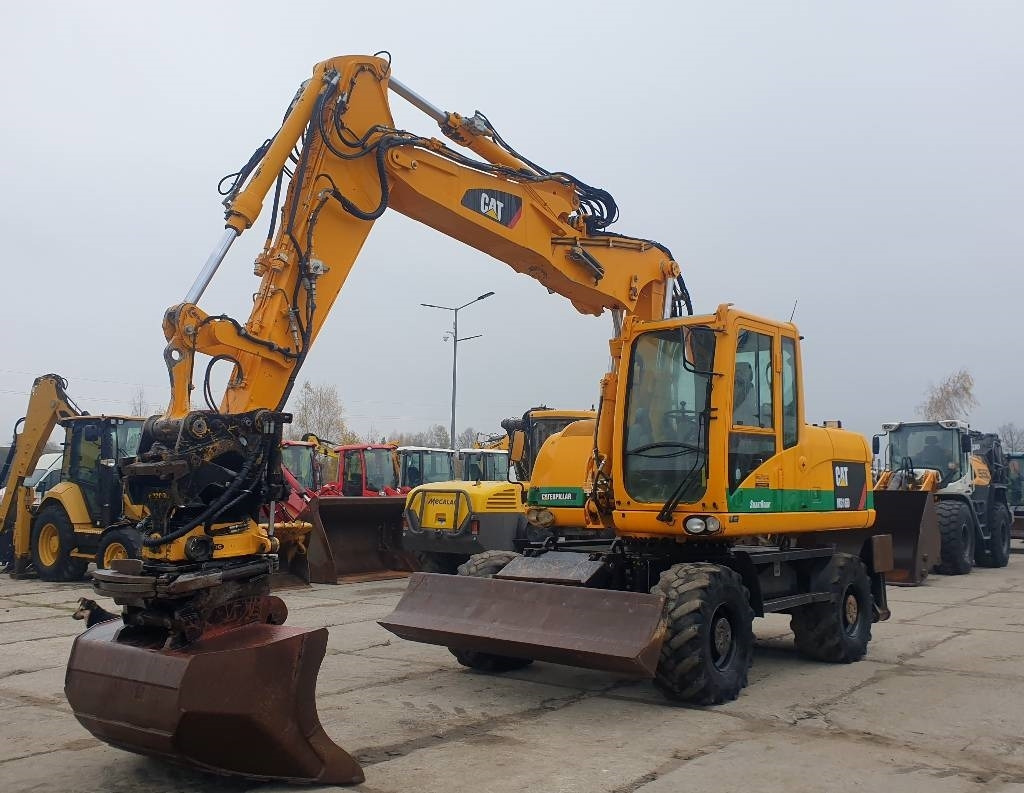 CAT M 316 D - Riteņu ekskavators: foto 1 CAT M 316 D - Riteņu ekskavators: foto 1