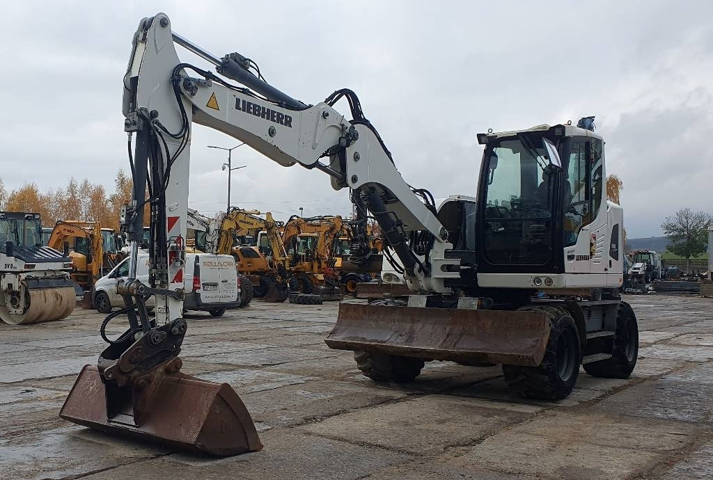 Liebherr A 912 Litronic - Riteņu ekskavators: foto 1 Liebherr A 912 Litronic - Riteņu ekskavators: foto 1