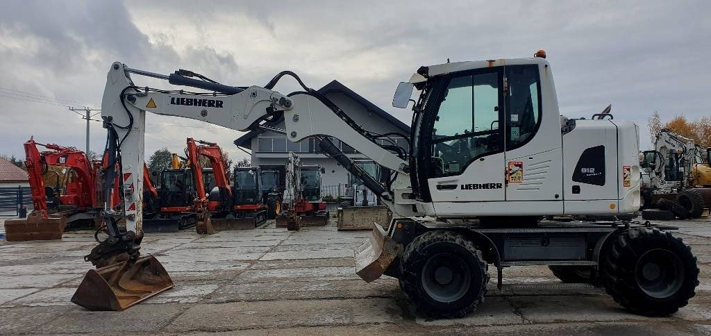 Liebherr A 912 Litronic - Riteņu ekskavators: foto 2 Liebherr A 912 Litronic - Riteņu ekskavators: foto 2