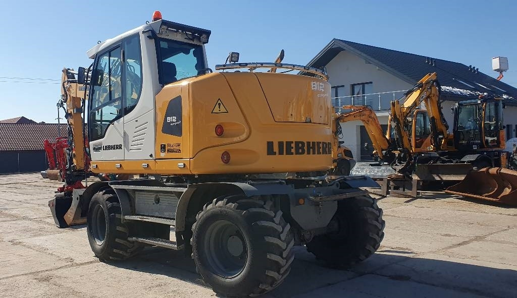 Liebherr A 912 compact - Riteņu ekskavators: foto 2 Liebherr A 912 compact - Riteņu ekskavators: foto 2