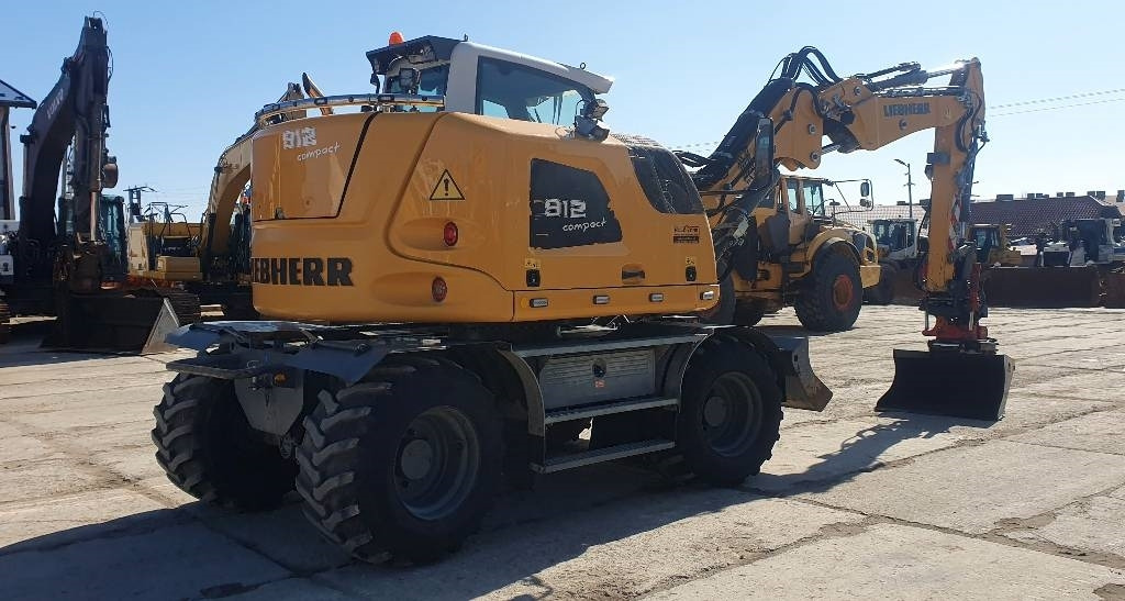 Liebherr A 912 compact - Riteņu ekskavators: foto 4 Liebherr A 912 compact - Riteņu ekskavators: foto 4