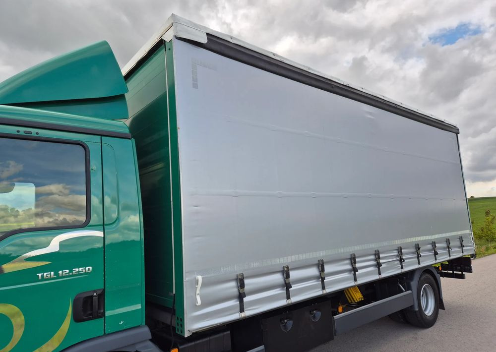 MAN TGL 12.250 6.2m AUTOMAT KLIMA z Niemiec ESP nowe opony EURO 6 / 4.75 rozstaw / zawiesie na wózek widłowy / TOP STAN / okazja nauka jazdy MOŻLIWOŚĆ DOSTOSOWANIA 12t - Kravas automašīna ar tentu: foto 4 MAN TGL 12.250 6.2m AUTOMAT KLIMA z Niemiec ESP nowe opony EURO 6 / 4.75 rozstaw / zawiesie na wózek widłowy / TOP STAN / okazja nauka jazdy MOŻLIWOŚĆ DOSTOSOWANIA 12t - Kravas automašīna ar tentu: foto 4