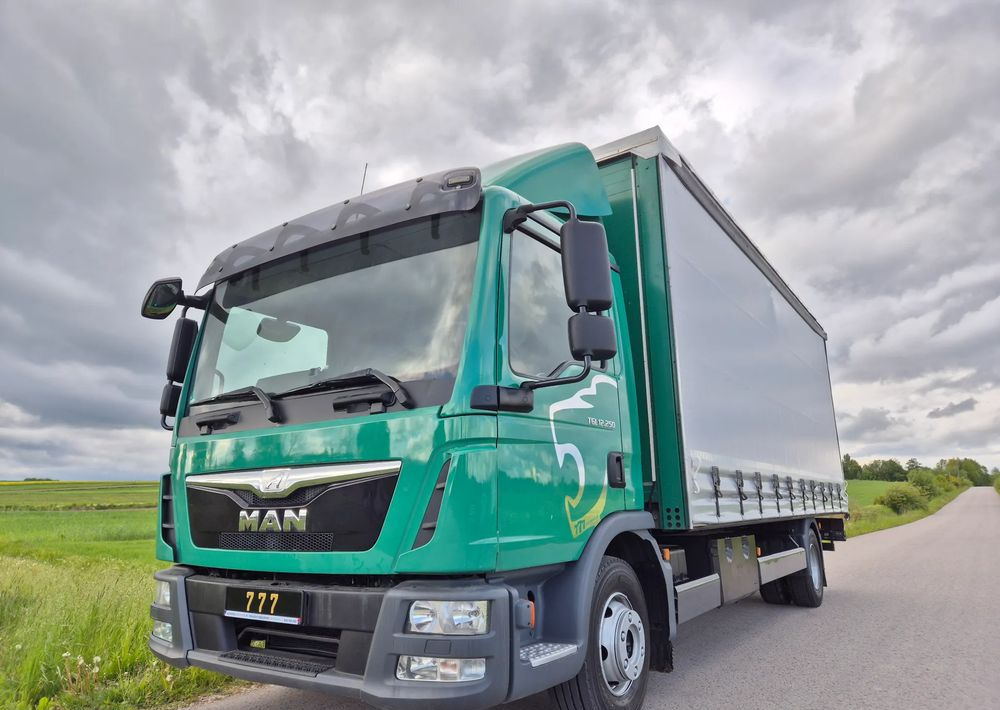 MAN TGL 12.250 6.2m AUTOMAT KLIMA z Niemiec ESP nowe opony EURO 6 / 4.75 rozstaw / zawiesie na wózek widłowy / TOP STAN / okazja nauka jazdy MOŻLIWOŚĆ DOSTOSOWANIA 12t - Kravas automašīna ar tentu: foto 2 MAN TGL 12.250 6.2m AUTOMAT KLIMA z Niemiec ESP nowe opony EURO 6 / 4.75 rozstaw / zawiesie na wózek widłowy / TOP STAN / okazja nauka jazdy MOŻLIWOŚĆ DOSTOSOWANIA 12t - Kravas automašīna ar tentu: foto 2