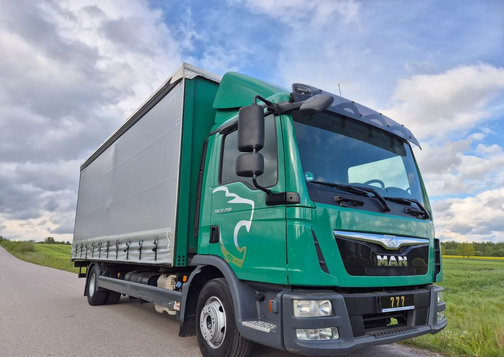 MAN TGL 12.250 6.2m AUTOMAT KLIMA z Niemiec ESP nowe opony EURO 6 / 4.75 rozstaw / zawiesie na wózek widłowy / TOP STAN / okazja nauka jazdy MOŻLIWOŚĆ DOSTOSOWANIA 12t - Kravas automašīna ar tentu: foto 1 MAN TGL 12.250 6.2m AUTOMAT KLIMA z Niemiec ESP nowe opony EURO 6 / 4.75 rozstaw / zawiesie na wózek widłowy / TOP STAN / okazja nauka jazdy MOŻLIWOŚĆ DOSTOSOWANIA 12t - Kravas automašīna ar tentu: foto 1