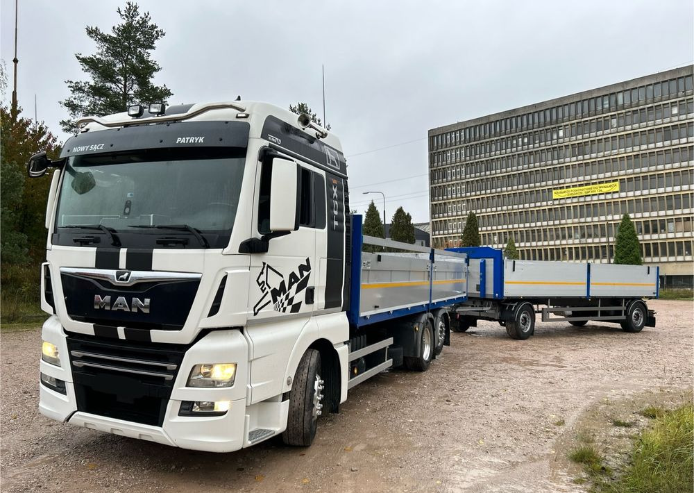MAN TGX Tandem 1m burty TOP KOMPLET / ALUFELGI / zarejestrowany gotowy do pracy / przyczepa 18t / FULL OPCJA / 26.420 26.460 26.500 26.400 26.440 26.480 26.510 460 500 - Bortu kravas automašīna/ Platforma: foto 1 MAN TGX Tandem 1m burty TOP KOMPLET / ALUFELGI / zarejestrowany gotowy do pracy / przyczepa 18t / FULL OPCJA / 26.420 26.460 26.500 26.400 26.440 26.480 26.510 460 500 - Bortu kravas automašīna/ Platforma: foto 1