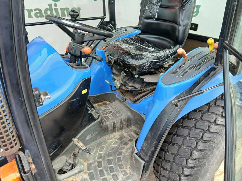 Traktors New Holland TC 27: foto 16 Traktors New Holland TC 27: foto 16