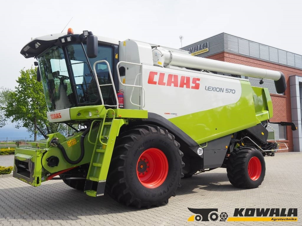 Claas Lexion 570 4WD + V750 - Labības kombains: foto 1 Claas Lexion 570 4WD + V750 - Labības kombains: foto 1