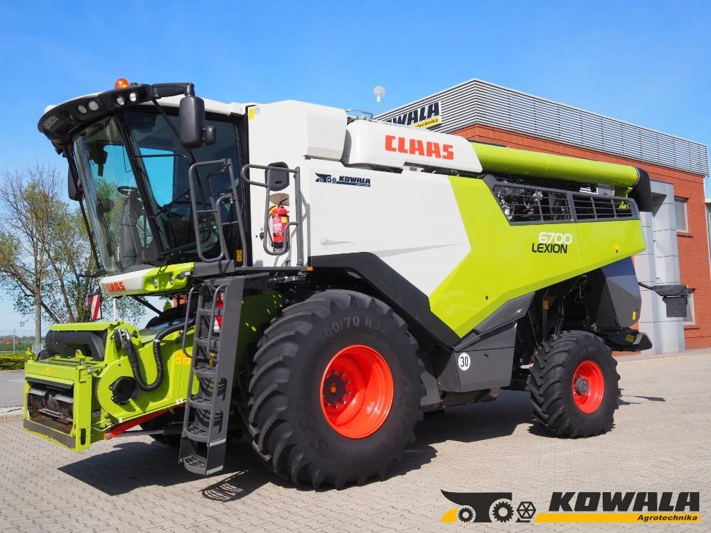 Claas Lexion 6700 + V770 - Labības kombains: foto 1 Claas Lexion 6700 + V770 - Labības kombains: foto 1