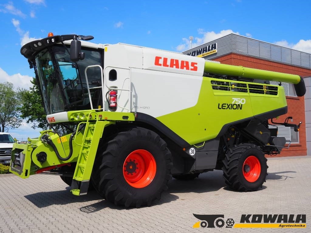 Claas Lexion 750 GPS + V930 - Labības kombains: foto 1 Claas Lexion 750 GPS + V930 - Labības kombains: foto 1