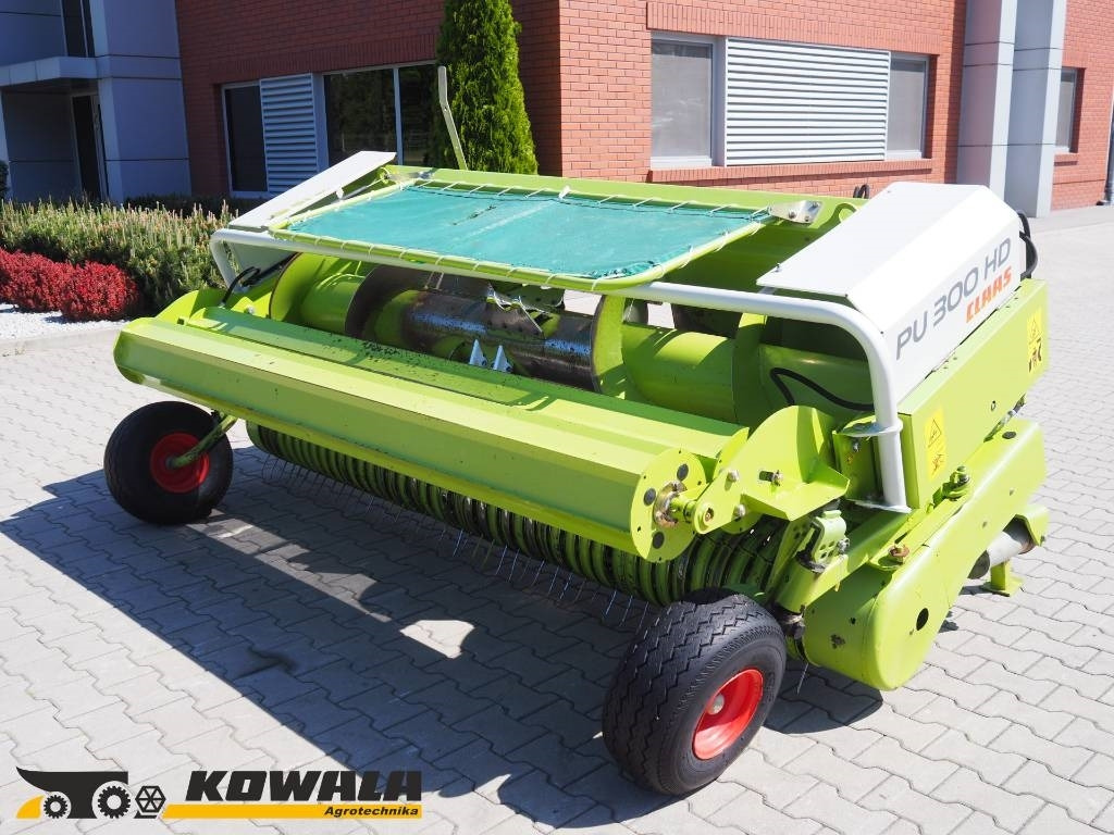 Claas PICK UP 300 HD - Lopbarības kombains: foto 1 Claas PICK UP 300 HD - Lopbarības kombains: foto 1