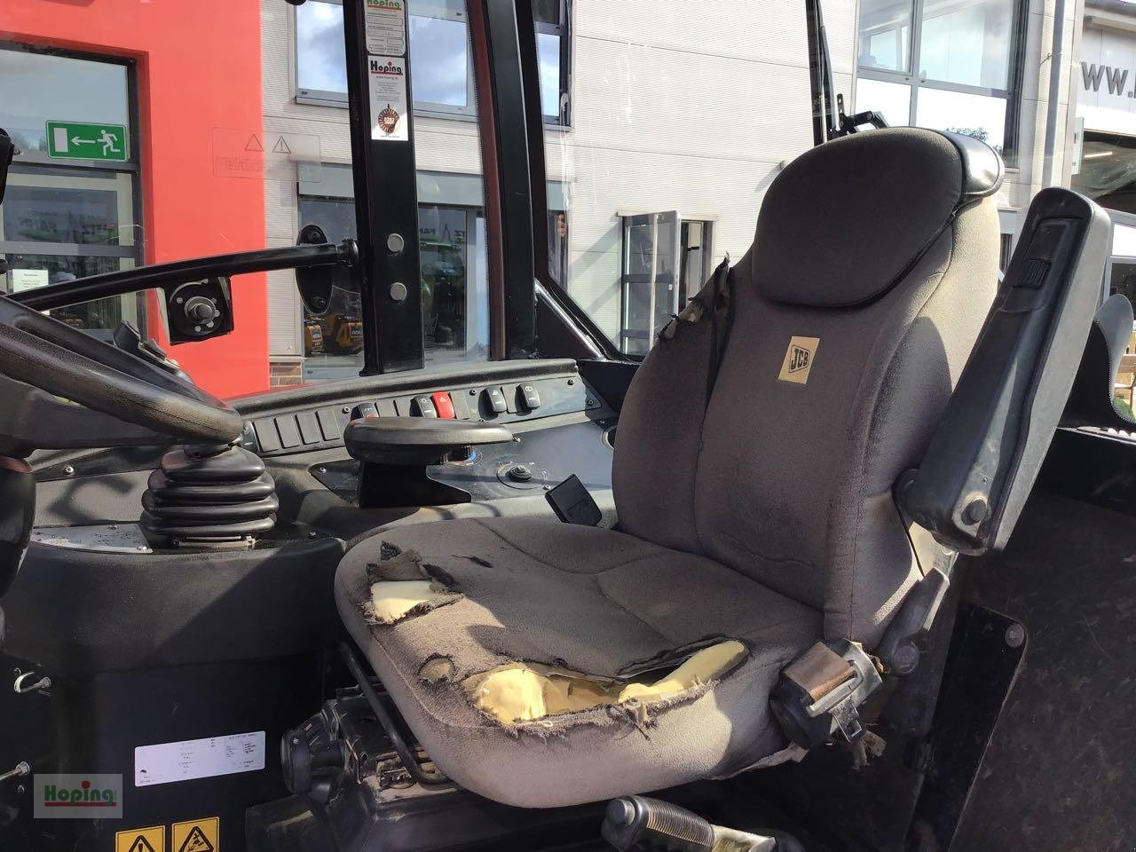 Riteņu iekrāvējs JCB 409: foto 8