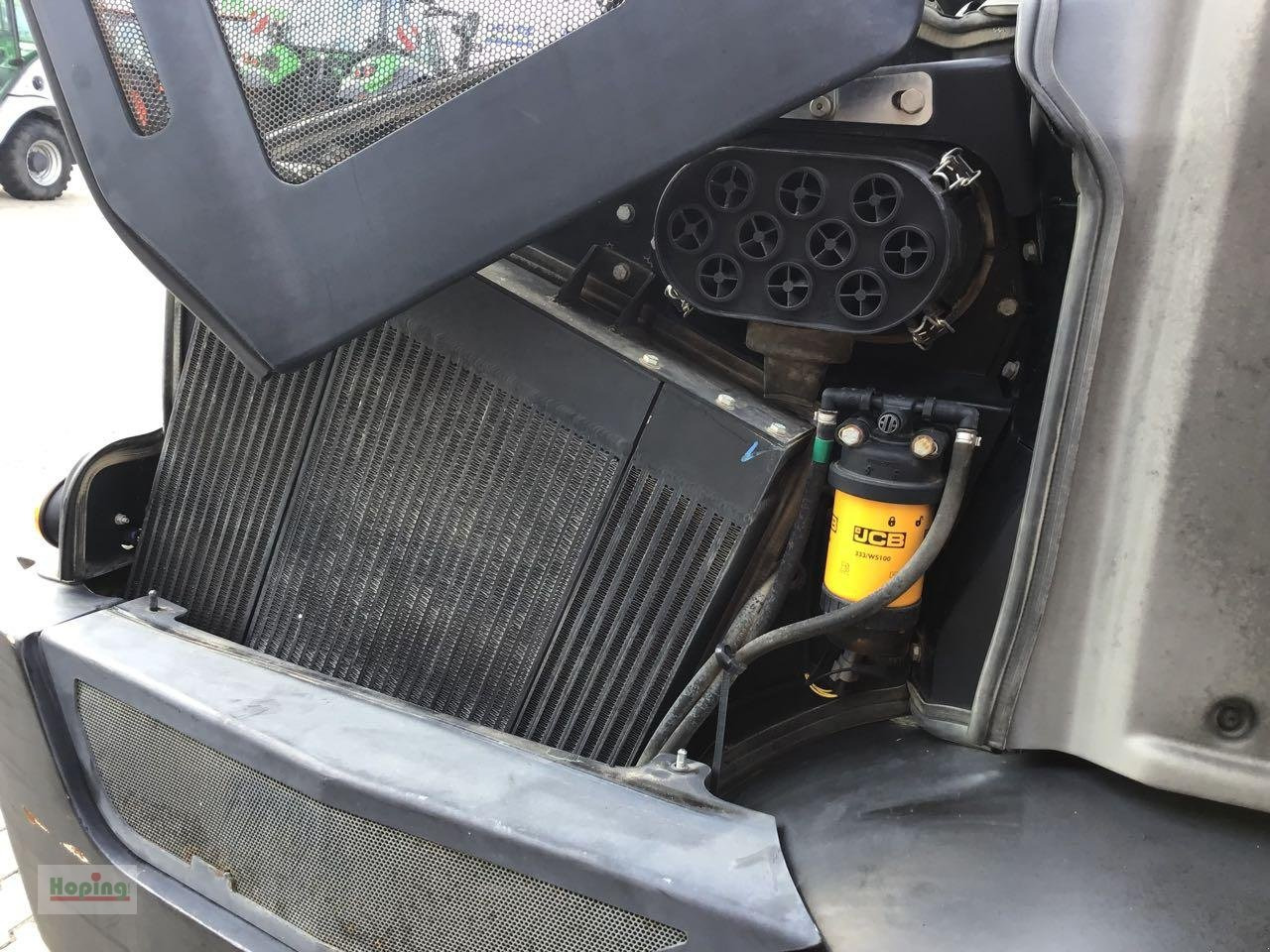 Riteņu iekrāvējs JCB 409: foto 9