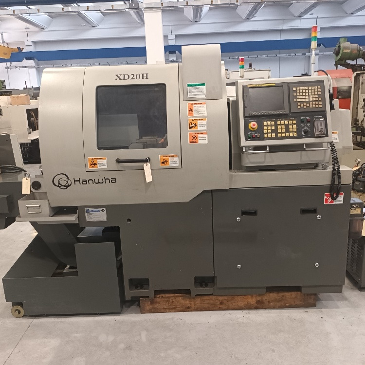 Tornio a fantina mobile a 5 assi Cnc Hanwha XD-20H - Metāla virpa: foto 1 Tornio a fantina mobile a 5 assi Cnc Hanwha XD-20H - Metāla virpa: foto 1