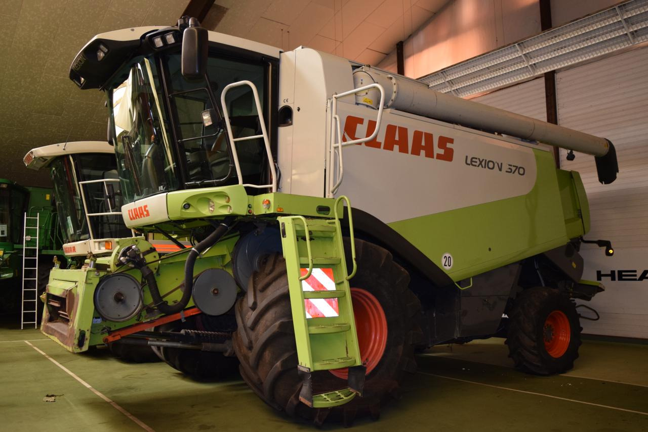 CLAAS Lexion 570 - Labības kombains: foto 1 CLAAS Lexion 570 - Labības kombains: foto 1
