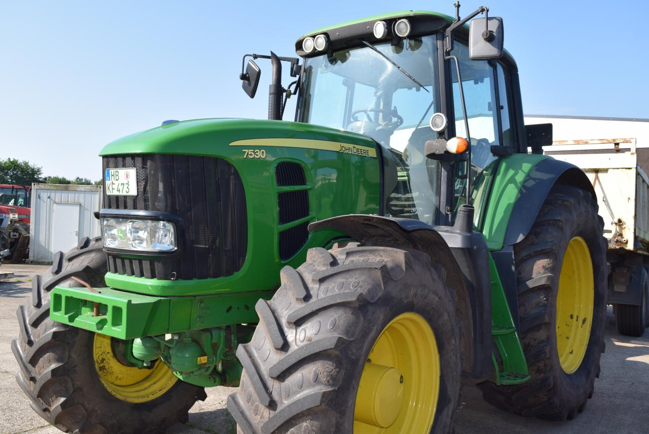 John Deere 7530 Premium - Traktors: foto 1 John Deere 7530 Premium - Traktors: foto 1
