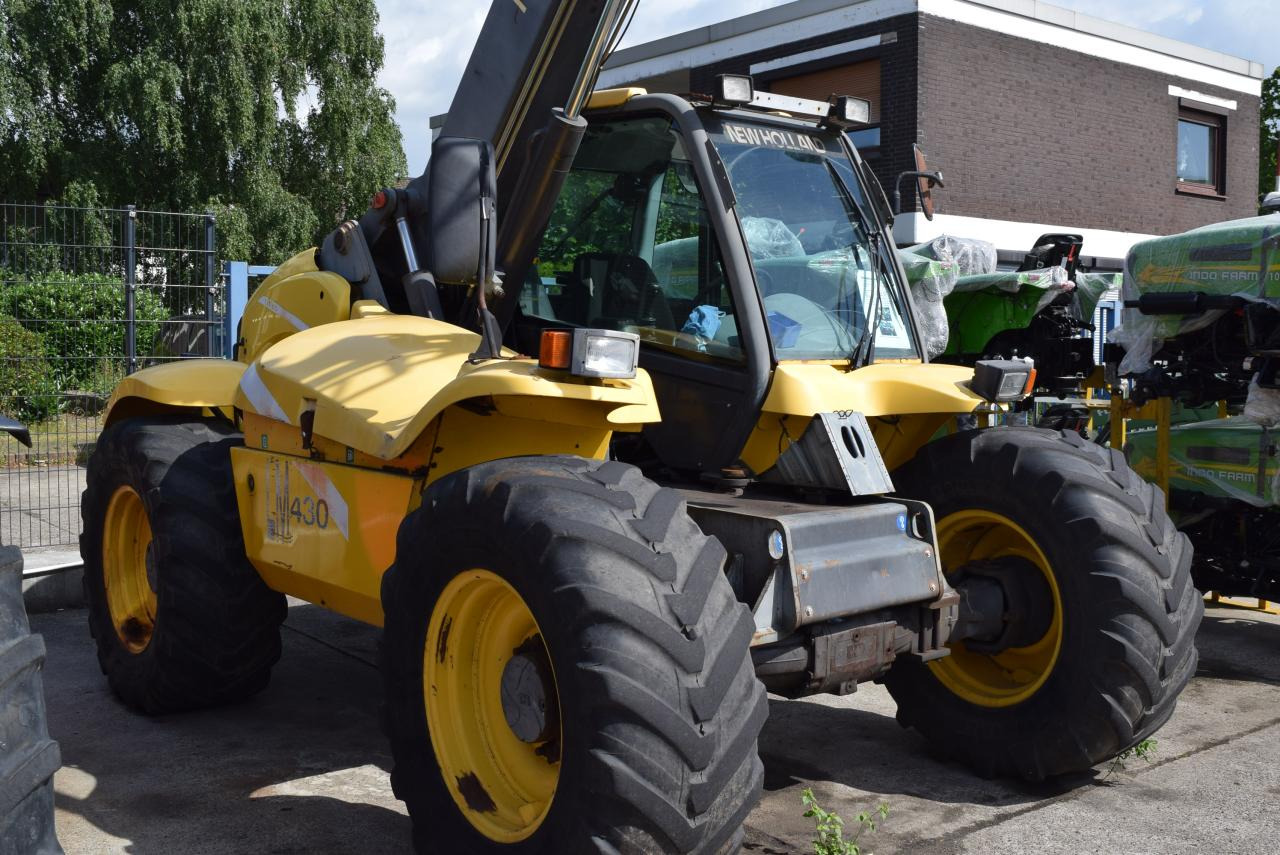 New Holland LM 430 - Teleskopiskais iekrāvējs: foto 2 New Holland LM 430 - Teleskopiskais iekrāvējs: foto 2