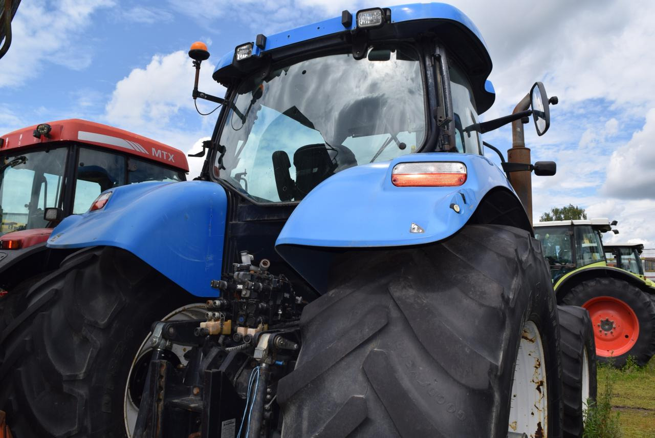 New Holland T 7040 - Traktors: foto 3 New Holland T 7040 - Traktors: foto 3