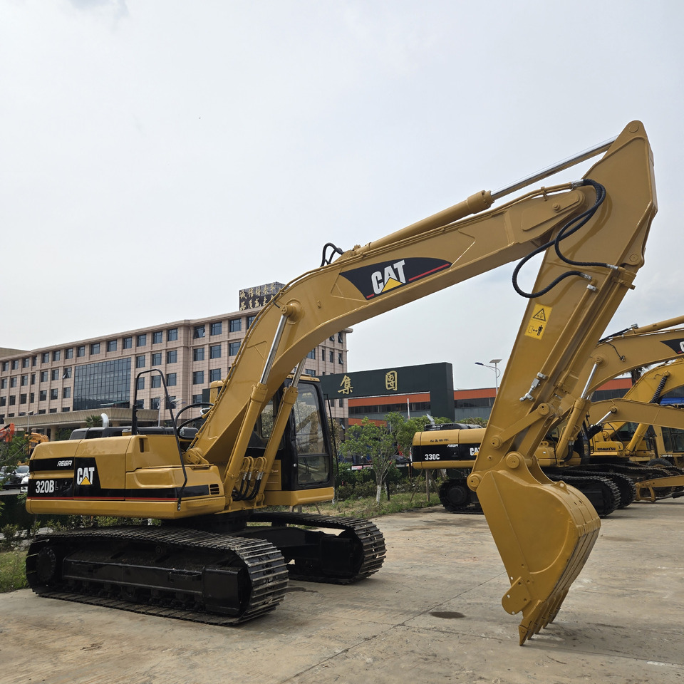 CATERPILLAR 320BL - Kāpurķēžu ekskavators: foto 1 CATERPILLAR 320BL - Kāpurķēžu ekskavators: foto 1