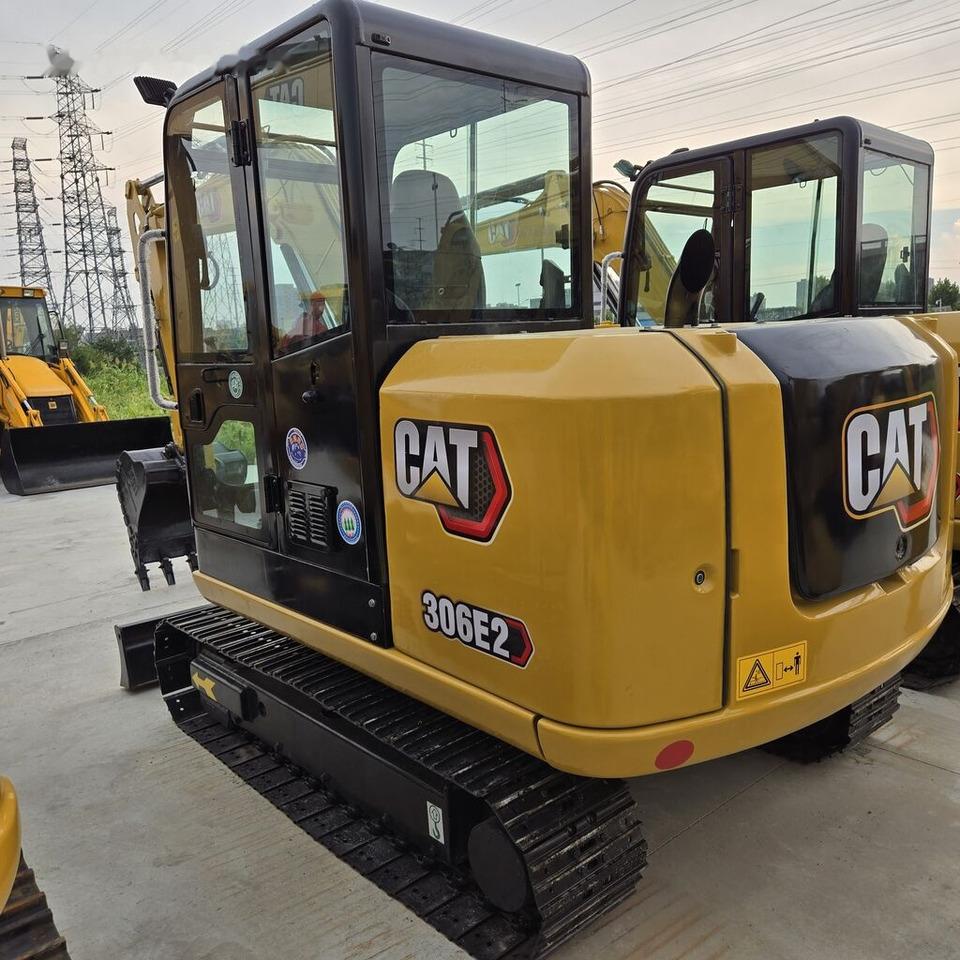 Caterpillar 306E2 - Mini-ekskavators: foto 1 Caterpillar 306E2 - Mini-ekskavators: foto 1