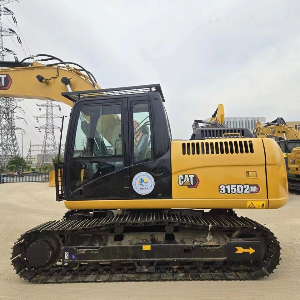 Caterpillar 315D2GC - Kāpurķēžu ekskavators: foto 1 Caterpillar 315D2GC - Kāpurķēžu ekskavators: foto 1