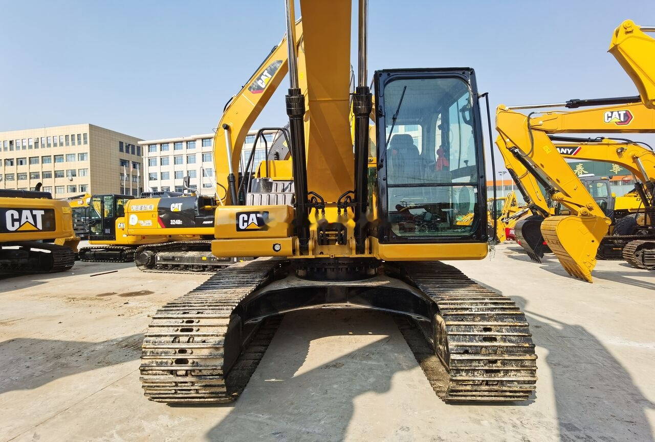 Caterpillar 320GC - Kāpurķēžu ekskavators: foto 1 Caterpillar 320GC - Kāpurķēžu ekskavators: foto 1