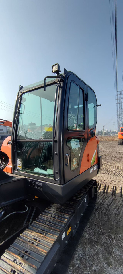 DOOSAN DX60E - Mini-ekskavators: foto 3 DOOSAN DX60E - Mini-ekskavators: foto 3