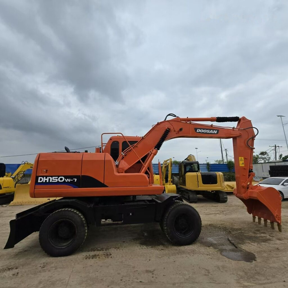 Doosan DH150W - Riteņu ekskavators: foto 1 Doosan DH150W - Riteņu ekskavators: foto 1