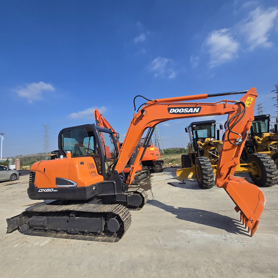 Doosan DX60 - Mini-ekskavators: foto 3 Doosan DX60 - Mini-ekskavators: foto 3