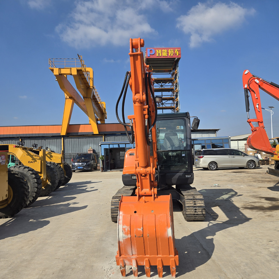 Doosan DX60 - Mini-ekskavators: foto 2 Doosan DX60 - Mini-ekskavators: foto 2