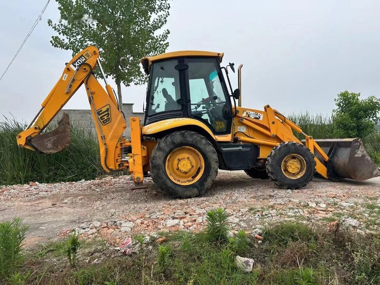 JCB 3CX - Ekskavators-iekrāvējs: foto 4 JCB 3CX - Ekskavators-iekrāvējs: foto 4