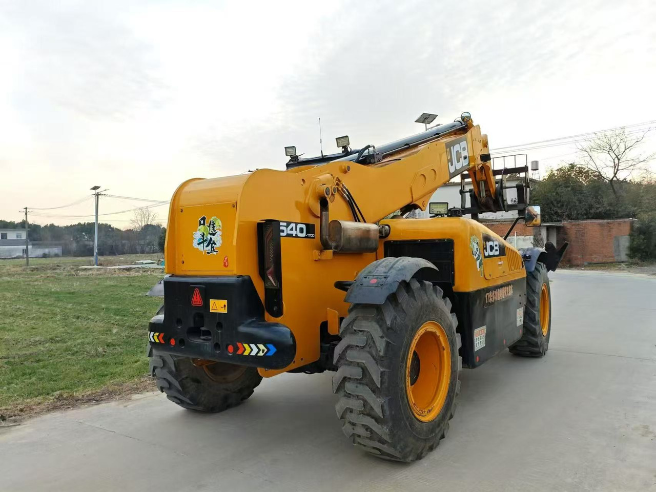 JCB 540-1700 - Sānu konteineru krāvējs: foto 3 JCB 540-1700 - Sānu konteineru krāvējs: foto 3