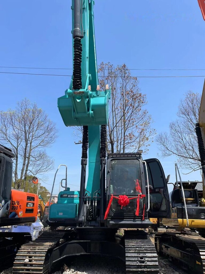 Kobelco SK200 - Kāpurķēžu ekskavators: foto 2 Kobelco SK200 - Kāpurķēžu ekskavators: foto 2