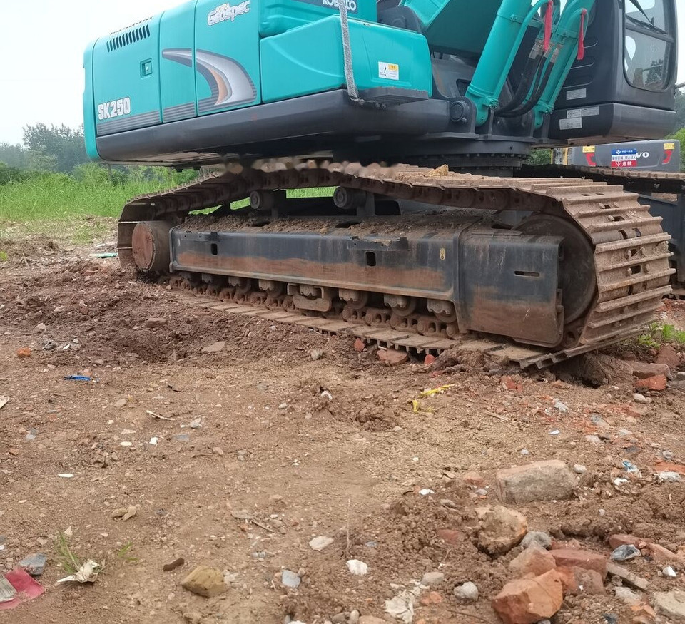 Kobelco SK250 - Kāpurķēžu ekskavators: foto 5 Kobelco SK250 - Kāpurķēžu ekskavators: foto 5