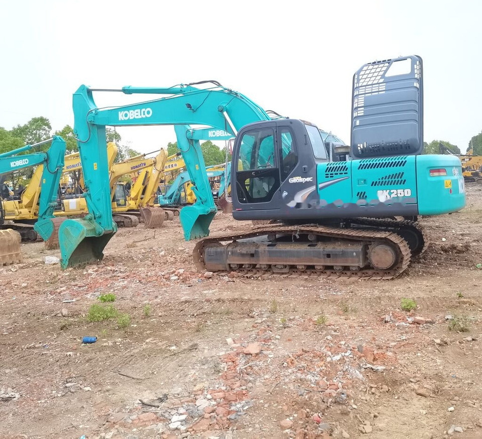 Kobelco SK250 - Kāpurķēžu ekskavators: foto 1 Kobelco SK250 - Kāpurķēžu ekskavators: foto 1