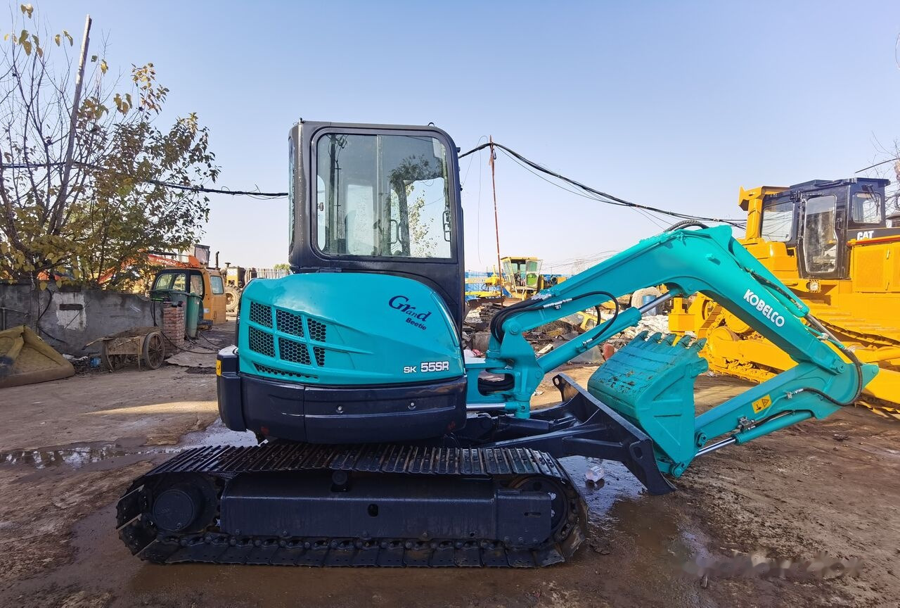 Kobelco SK55 - Mini-ekskavators: foto 1 Kobelco SK55 - Mini-ekskavators: foto 1