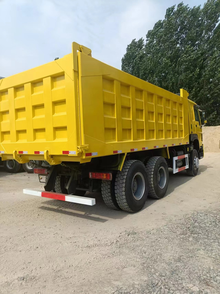 SINOTRUK HOWO - Kravas automašīna pašizgāzējs: foto 5 SINOTRUK HOWO - Kravas automašīna pašizgāzējs: foto 5
