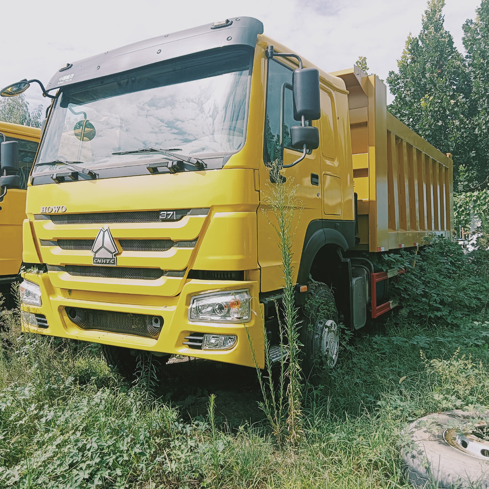 SINOTRUK HOWO - Kravas automašīna pašizgāzējs: foto 4 SINOTRUK HOWO - Kravas automašīna pašizgāzējs: foto 4