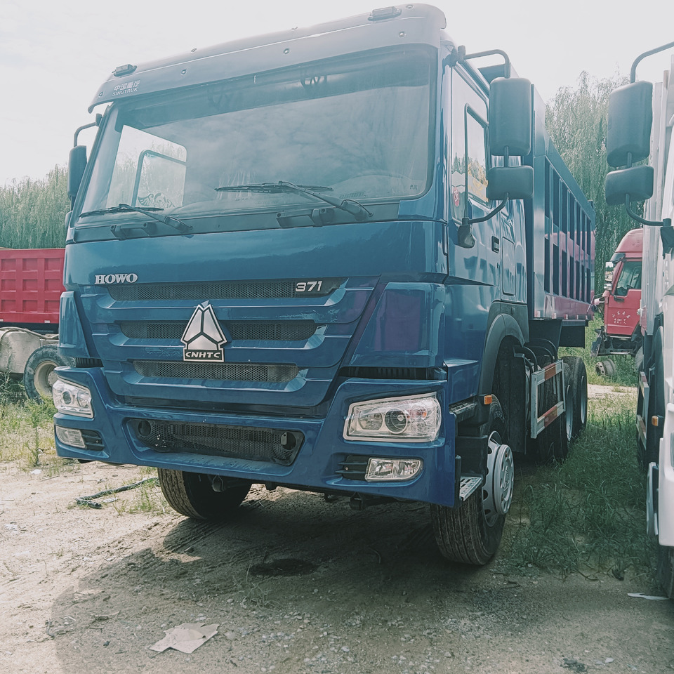 SINOTRUK HOWO - Kravas automašīna pašizgāzējs: foto 3 SINOTRUK HOWO - Kravas automašīna pašizgāzējs: foto 3