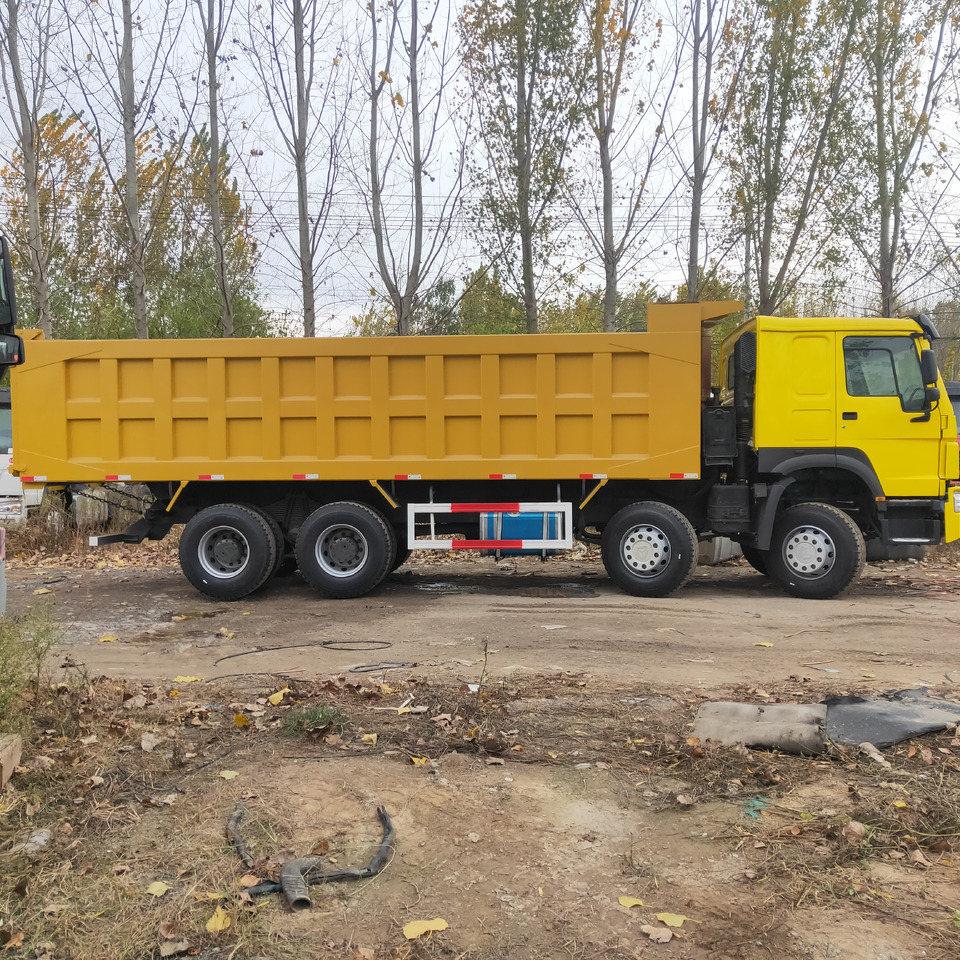 SINOTRUK HOWO - Kravas automašīna pašizgāzējs: foto 4 SINOTRUK HOWO - Kravas automašīna pašizgāzējs: foto 4