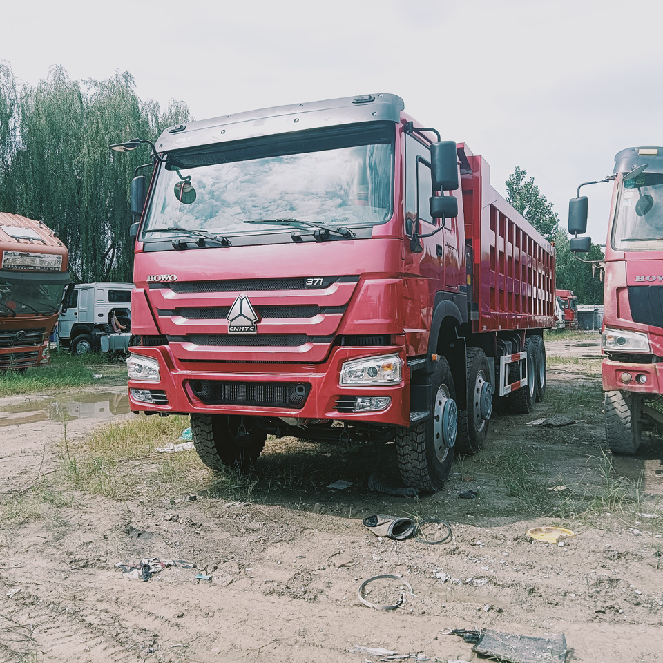 SINOTRUK HOWO - Kravas automašīna pašizgāzējs: foto 3 SINOTRUK HOWO - Kravas automašīna pašizgāzējs: foto 3
