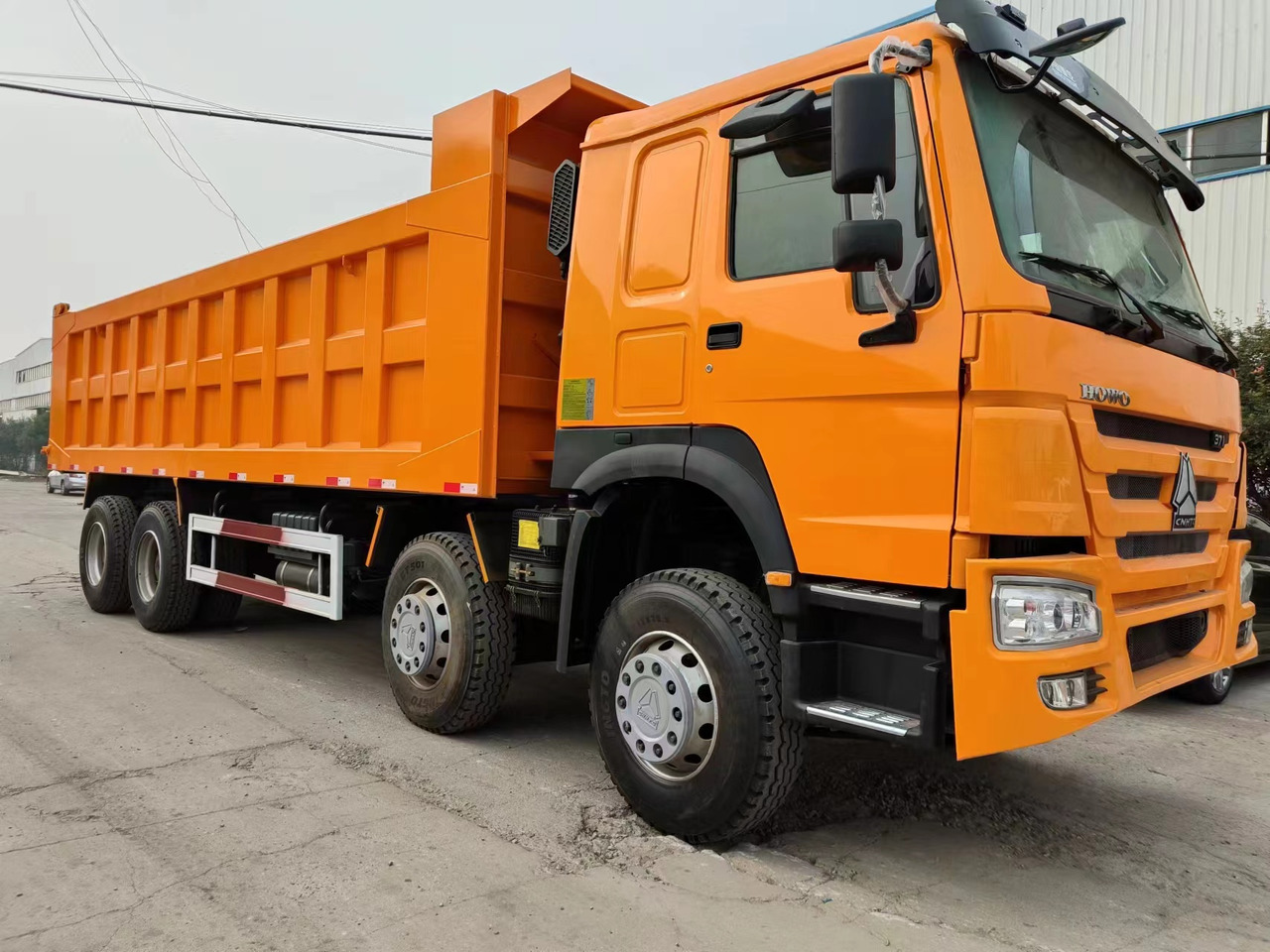 SINOTRUK Howo - Kravas automašīna pašizgāzējs: foto 5 SINOTRUK Howo - Kravas automašīna pašizgāzējs: foto 5