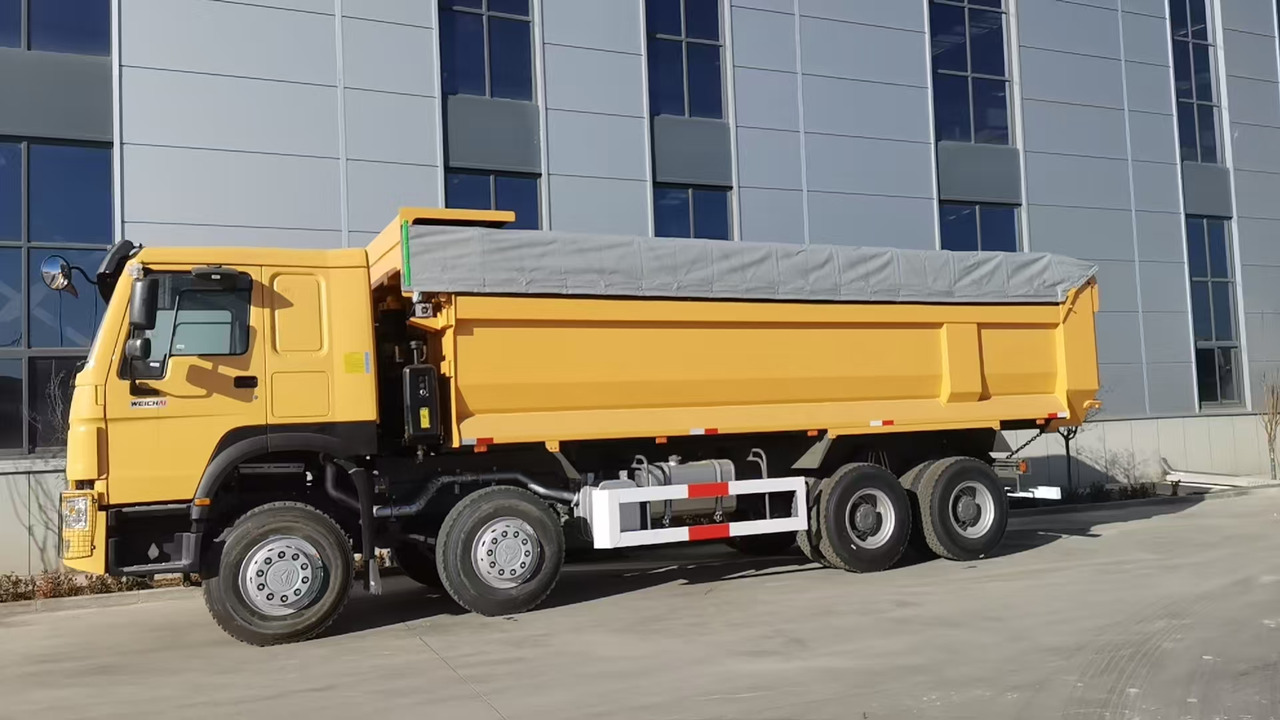 SINOTRUK Howo - Kravas automašīna pašizgāzējs: foto 1 SINOTRUK Howo - Kravas automašīna pašizgāzējs: foto 1