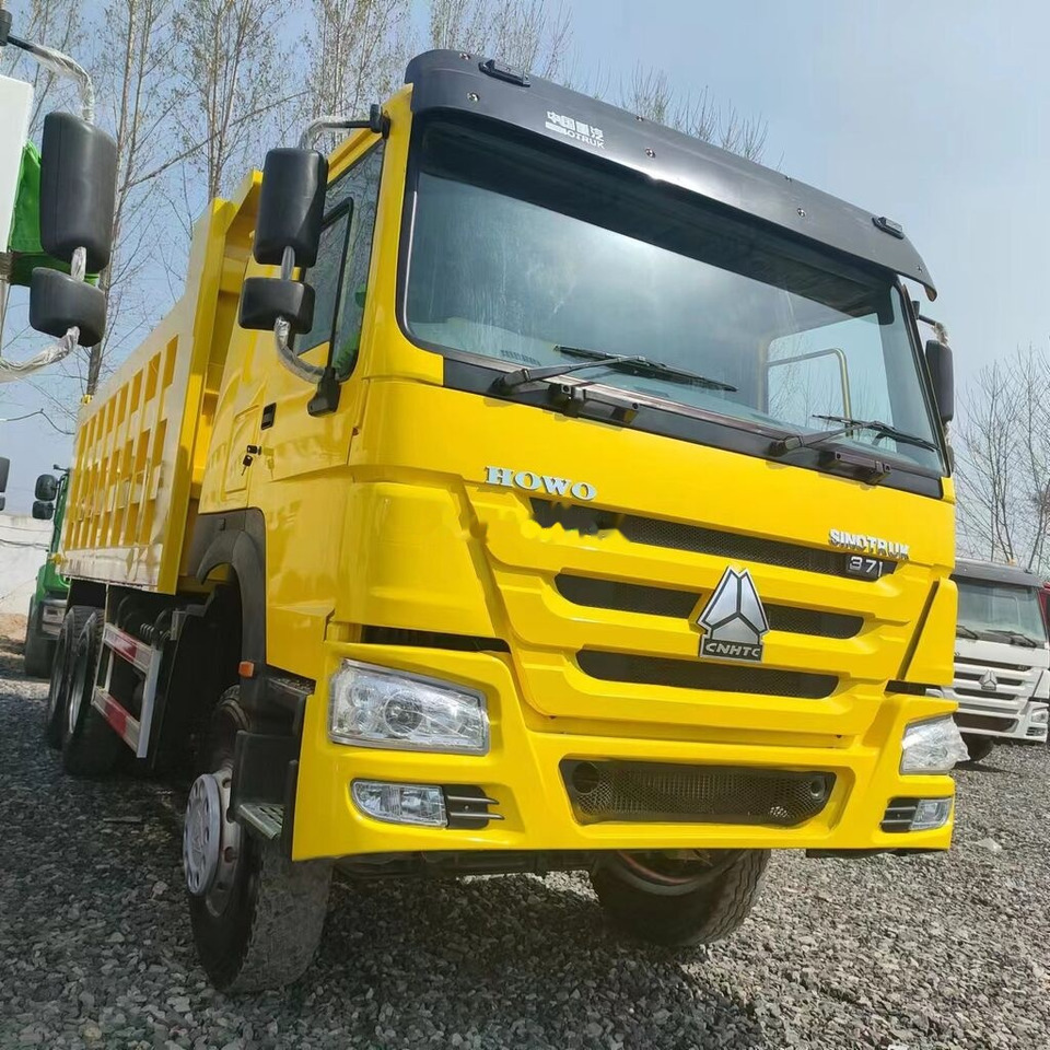 Sinotruk Howo 6*4 Right hand drive - Kravas automašīna pašizgāzējs: foto 2 Sinotruk Howo 6*4 Right hand drive - Kravas automašīna pašizgāzējs: foto 2
