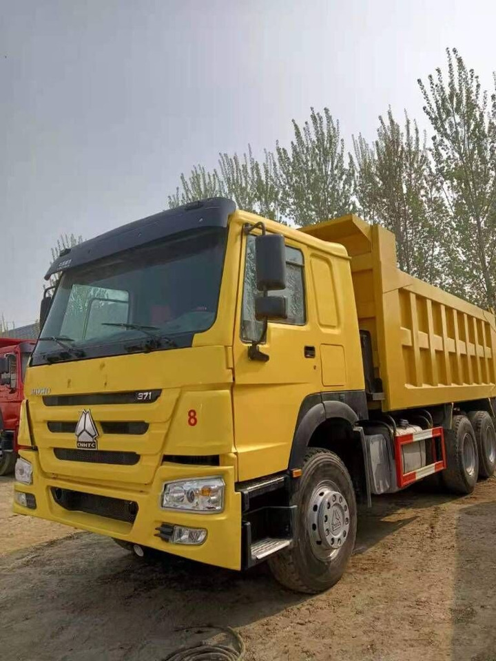 Sinotruk Howo - Kravas automašīna pašizgāzējs: foto 1 Sinotruk Howo - Kravas automašīna pašizgāzējs: foto 1