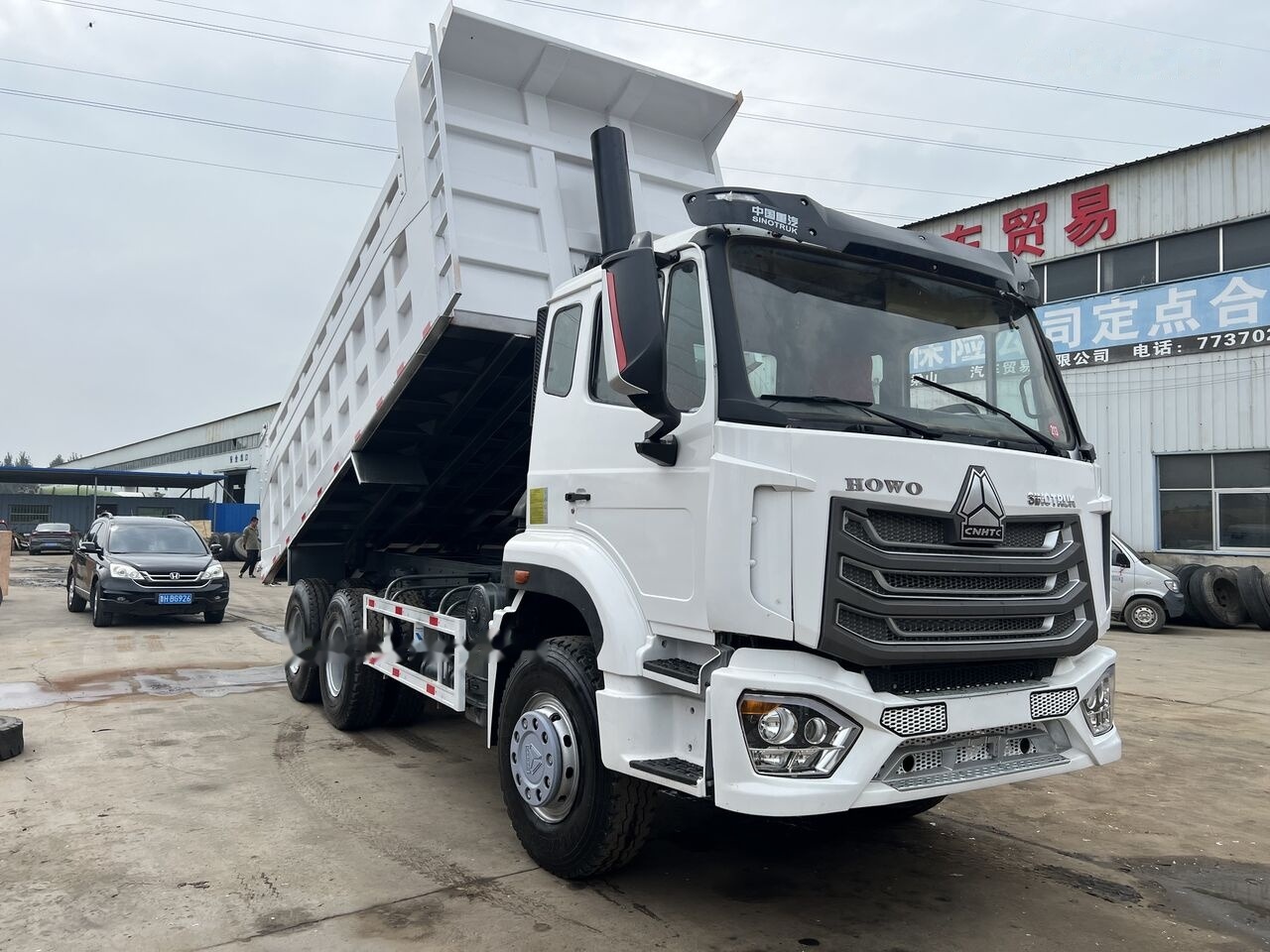 Sinotruk Howo - Kravas automašīna pašizgāzējs: foto 4 Sinotruk Howo - Kravas automašīna pašizgāzējs: foto 4