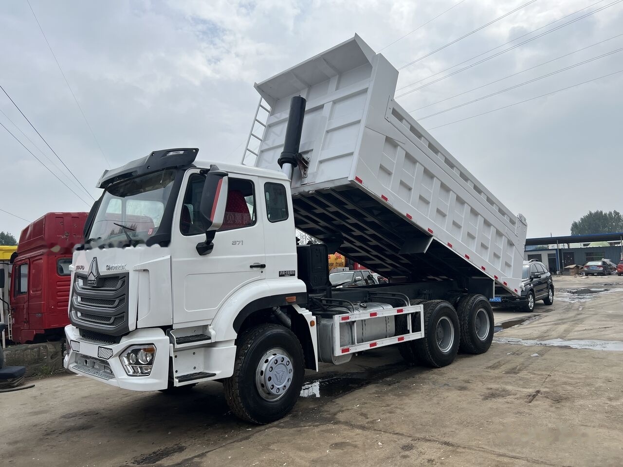 Sinotruk Howo - Kravas automašīna pašizgāzējs: foto 3 Sinotruk Howo - Kravas automašīna pašizgāzējs: foto 3