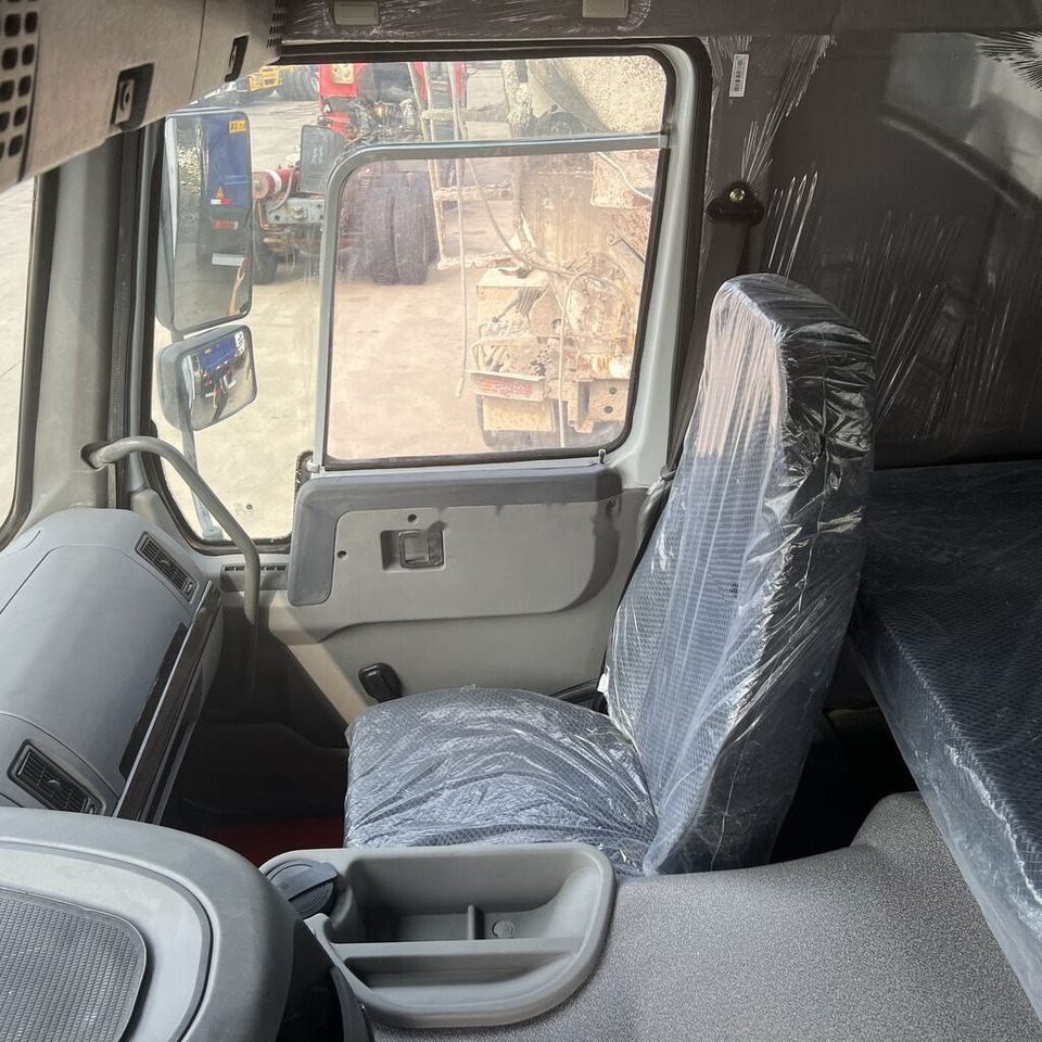 Sinotruk Howo  - Kravas automašīna pašizgāzējs: foto 4 Sinotruk Howo  - Kravas automašīna pašizgāzējs: foto 4