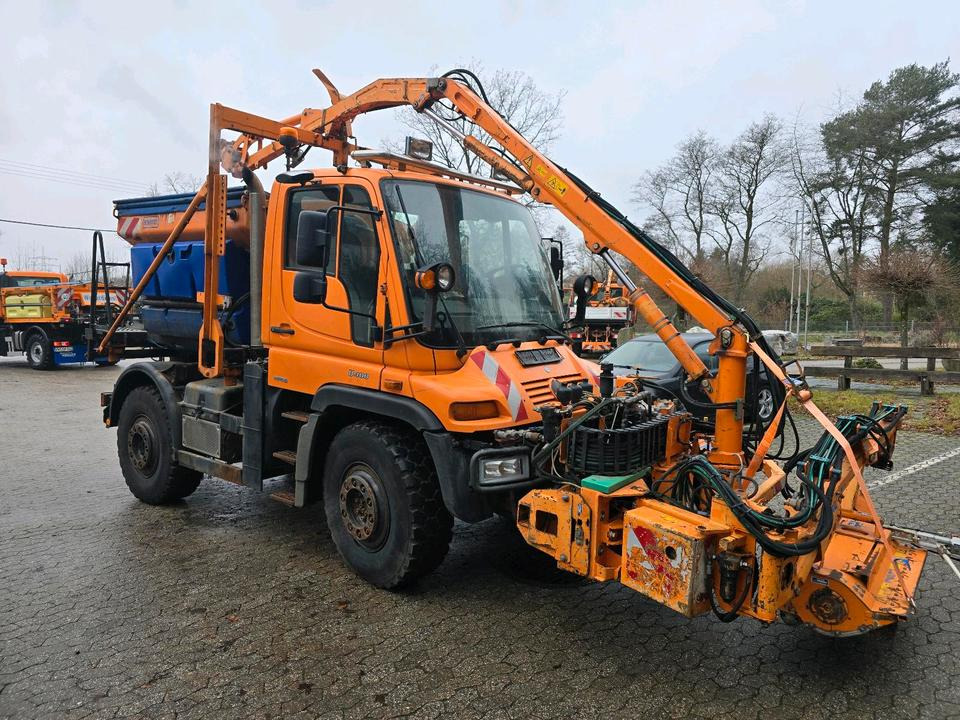 Mercedes-Benz Unimog 405 U400 mit Mulag MKM 700 Schmidt Stratos Salzstreuer 400 500 300 423 430 527 Dücker - Komunālā/ Specializētā tehnika: foto 2 Mercedes-Benz Unimog 405 U400 mit Mulag MKM 700 Schmidt Stratos Salzstreuer 400 500 300 423 430 527 Dücker - Komunālā/ Specializētā tehnika: foto 2