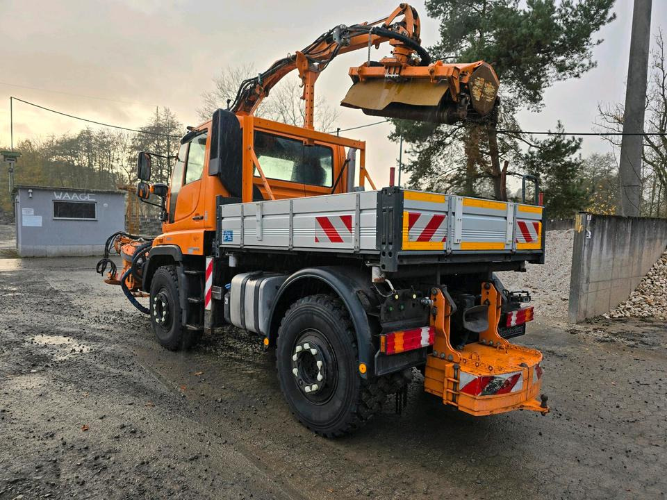 Unimog U400 2011 Bluetec 5 Mercedes-Benz 405 423 427 300 U 500 Mulag MKM Mähausleger Böschungsmäher Böschungsmulcher FME Dücker - Komunālā/ Specializētā tehnika: foto 5 Unimog U400 2011 Bluetec 5 Mercedes-Benz 405 423 427 300 U 500 Mulag MKM Mähausleger Böschungsmäher Böschungsmulcher FME Dücker - Komunālā/ Specializētā tehnika: foto 5