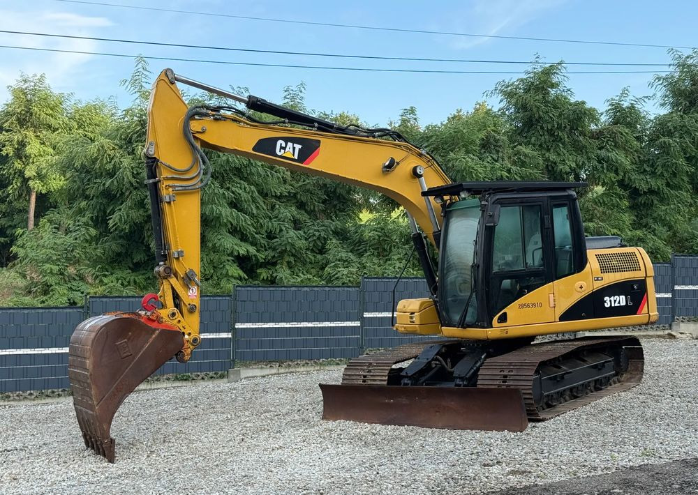 Caterpillar * Koparka CAT 312 D L * Szybkozłącze * Bardzo Dobry Stan * Caterpillar - Kāpurķēžu ekskavators: foto 1 Caterpillar * Koparka CAT 312 D L * Szybkozłącze * Bardzo Dobry Stan * Caterpillar - Kāpurķēžu ekskavators: foto 1